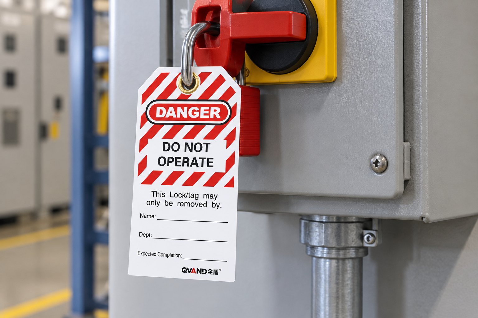 Custom PVC lockout tag attached with a red safety padlock on industrial equipment